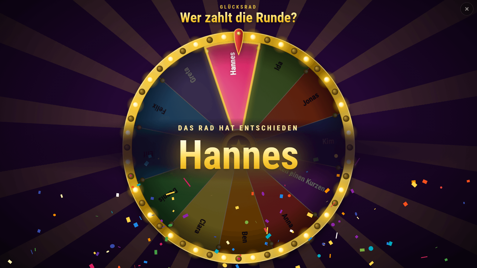 Wheel of fortune after the spin: spotlight on the segment “Hannes”, above it “Das Rad hat entschieden” (the wheel has decided) and the name in large letters, confetti all around
