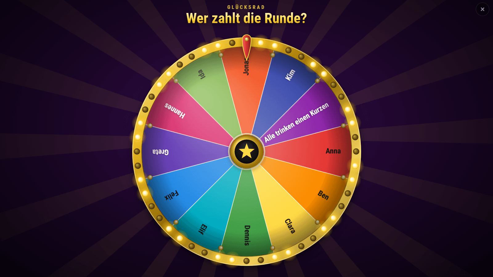 Wheel of fortune “Wer zahlt die Runde?” (who pays for the round?) on the TV display: twelve colourful segments with first names and “Alle trinken einen Kurzen” (everyone has a shot), a golden rim with chasing lights and a red pointer